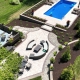 Backyard pool and landscaping project by Upscale Lawncare