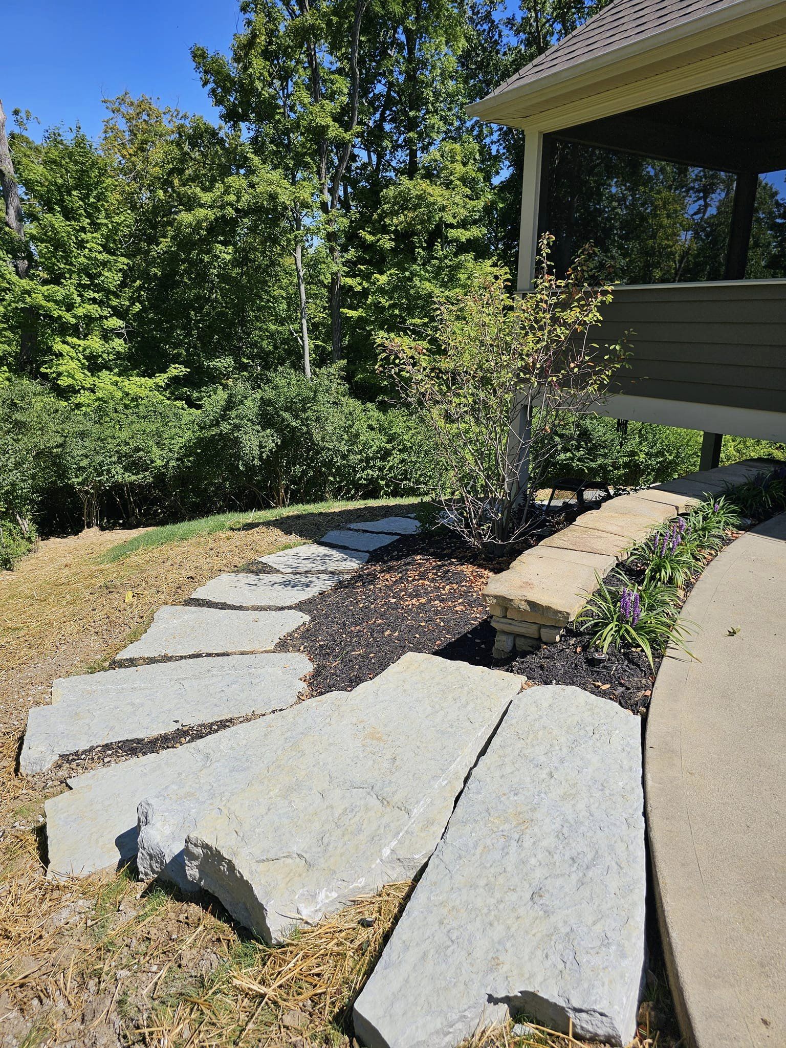 natural stone featured in this landscape makeover