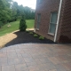 backyard landscaping installation with unilock pavers in Green Township, Ohio