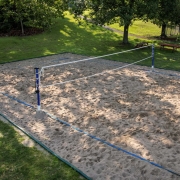 Image of a volleyball court installation at the Three Rivers Swim Club.