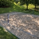 Image of a volleyball court installation at the Three Rivers Swim Club.