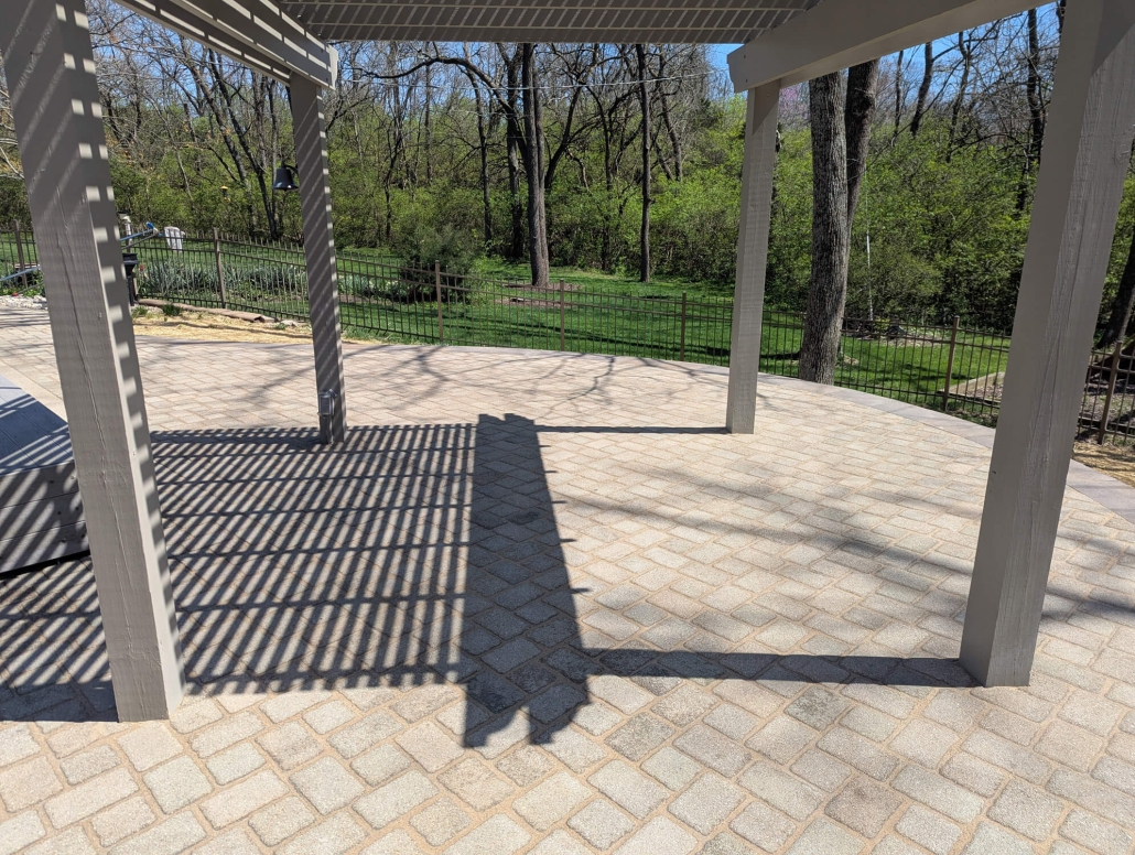 After photo of paver patio restoration and retaining wall