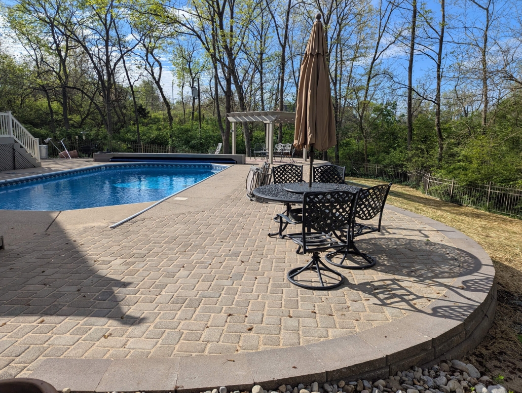 After photo of paver patio restoration and retaining wall