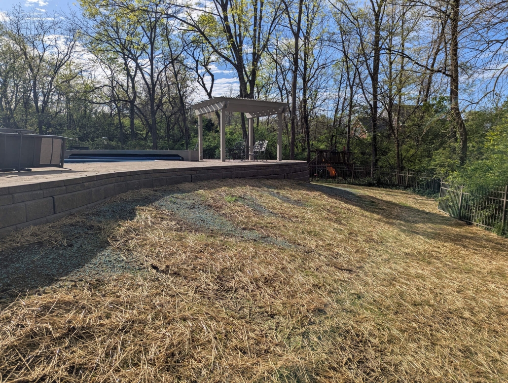 After photo of paver patio restoration and retaining wall
