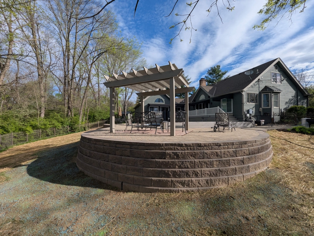After photo of paver patio restoration and retaining wall