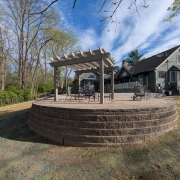 After photo of paver patio restoration and retaining wall